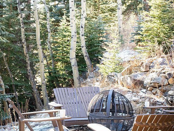 Firepit and comfy chairs are yours for your morning coffee or post-hike hot chocolate