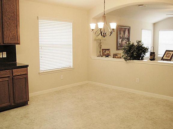 Huge combination kitchen/breakfast area...New light fixtures and ceiling fans throughout the home
