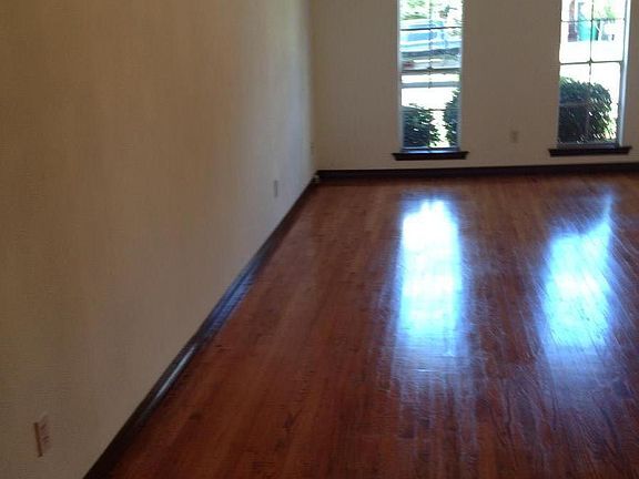 Living room dining room combination with wood floors