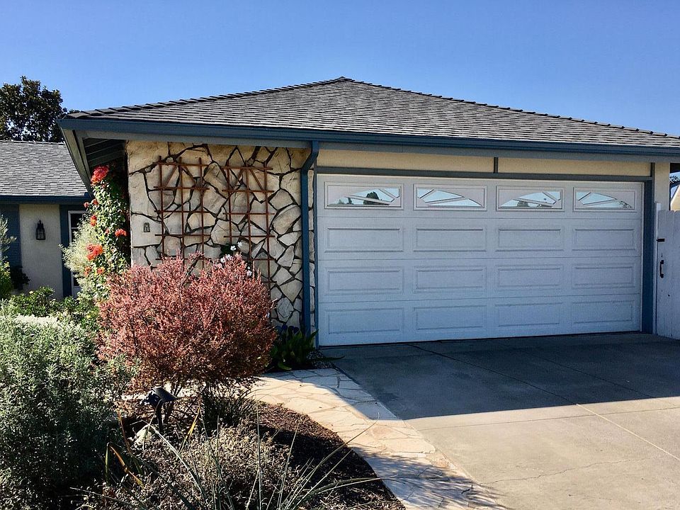 The new dry scape front yard is watered by a Smart WiFi drip irrigation system. The front walkway LED lighting is also controlled by a Smart WiFi system.