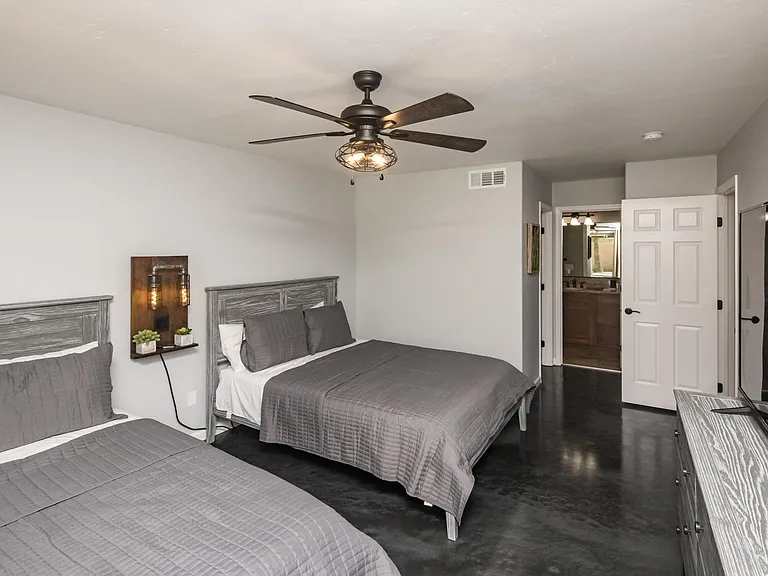 Expansive Master bedroom showing hallway access and en-suite proximity for added convenience.