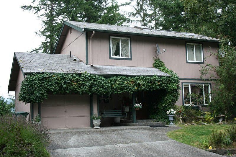 Welcome to 25 North Summit. Nestled in the woods. Level driveway, lots of privacy and great view of 