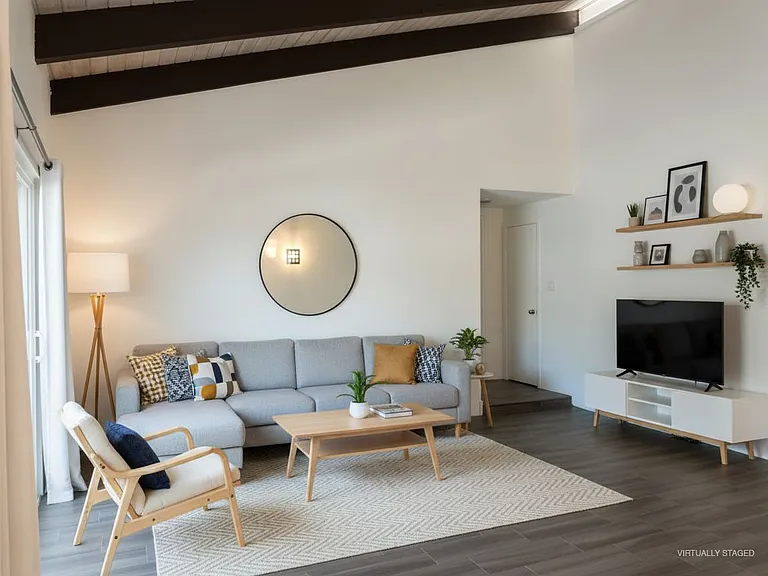 The living room_virtually staged_to help you imagine yourself living in your sanctuary!