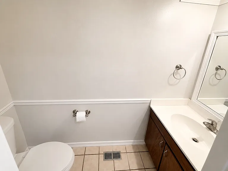 First-Floor Half Bathroom _
A conveniently located half bathroom on the main level adds comfort and functionality, perfect for guests and daily use.