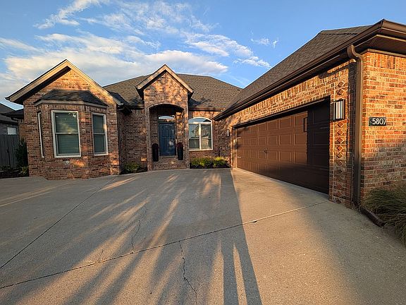 Front Door and 2-car Garage 