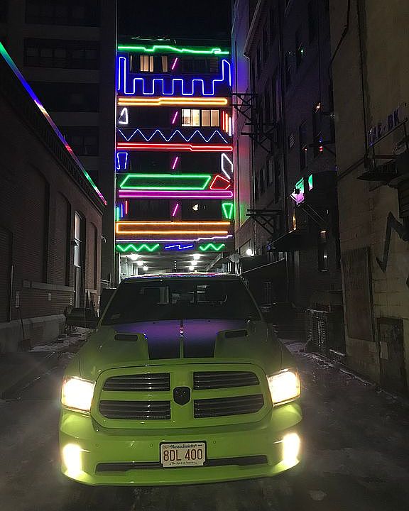 Neon mural back entrance 