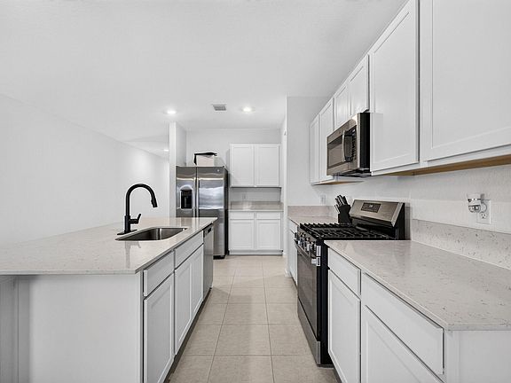 5th image of 5876 NW Sweetwood Dr