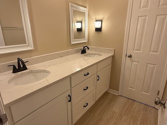 Bathroom remodel all new floor, paint, vanity in 2025