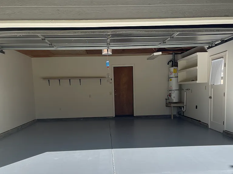 painted walls/floor 
2 car GARAGE