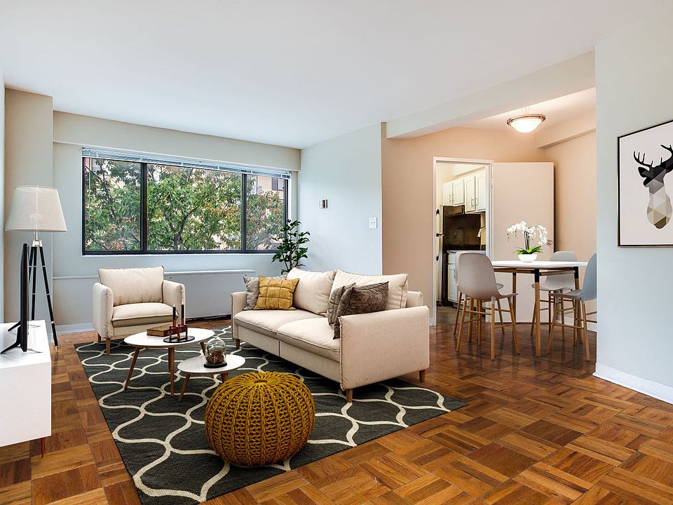 Living and dining area (virtually staged)