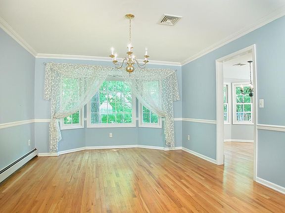 Legant Dining Room with bay Window