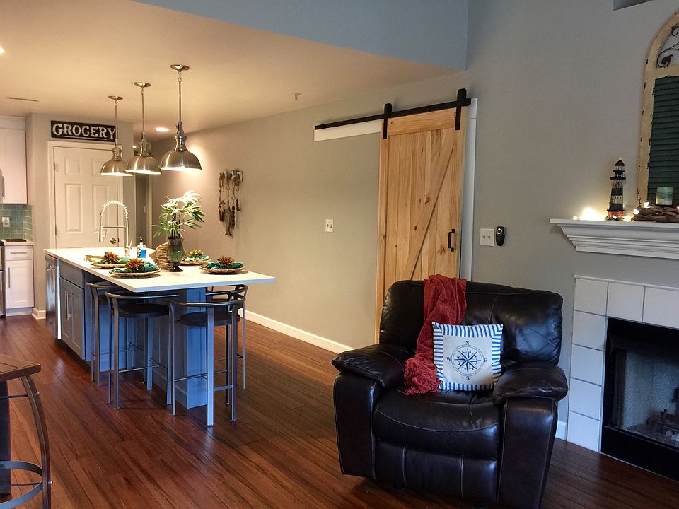 Kitchen & hidden desk area w/ barn door