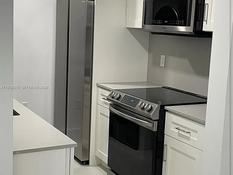 10275 Collins Ave #208 — Photo 6