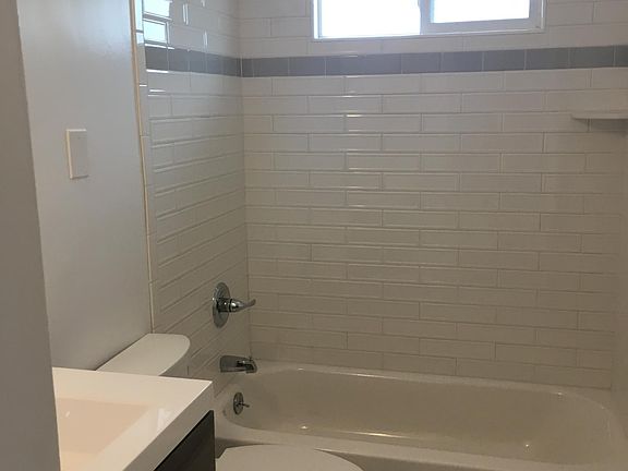 Upgraded Bathroom: Tiled Shower + Tub