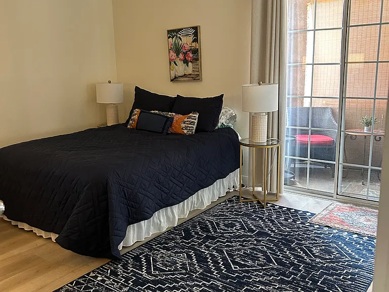 Main bedroom with balcony