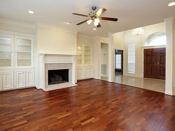 Large Formal Living is Open to Two Story Entry Hall