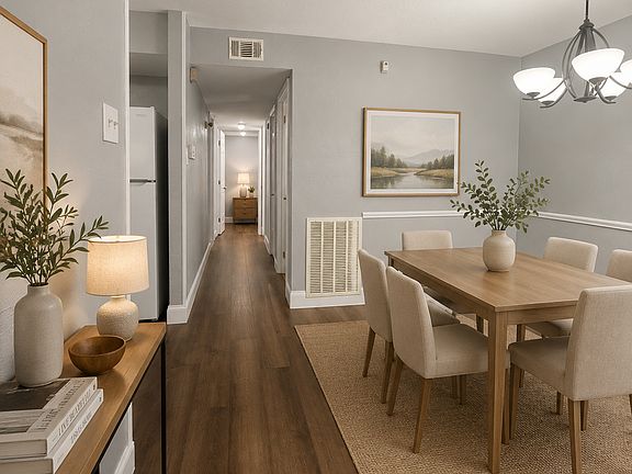 Dinning area and hallway shown furnished
