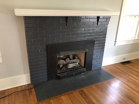 Propane powered gas log inserts.