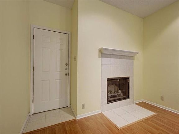 A cozy fireplace is available to use during chilly weather.