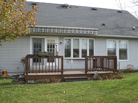 Deck with rollout awning