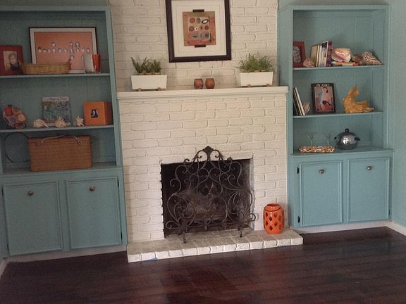 Hearth room open to kitchen, laminate wood flooring. Living 