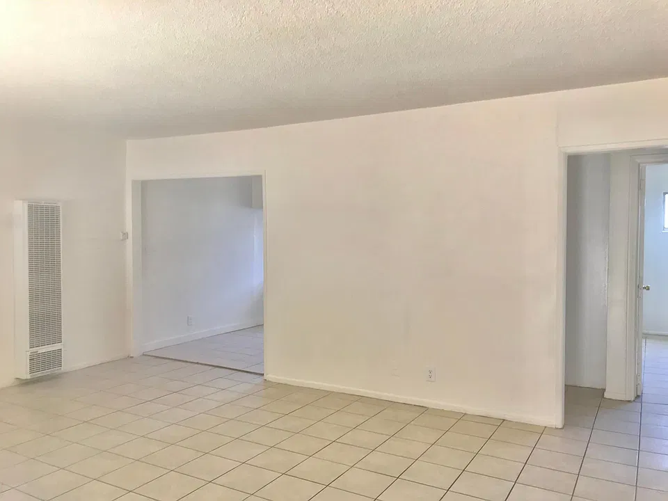 From front door see wall heater & dinning area