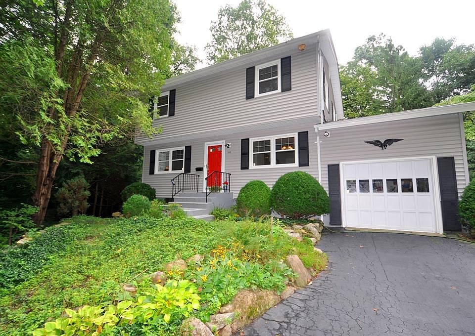Renovated 1,700 Sq Ft, three bedroom, three bath center hall colonial. The home has been fully renovated with new baths, updated kitchen with granite counters and stainless steel appliances, master bedroom en suite refinished hardwood floors, wood burning