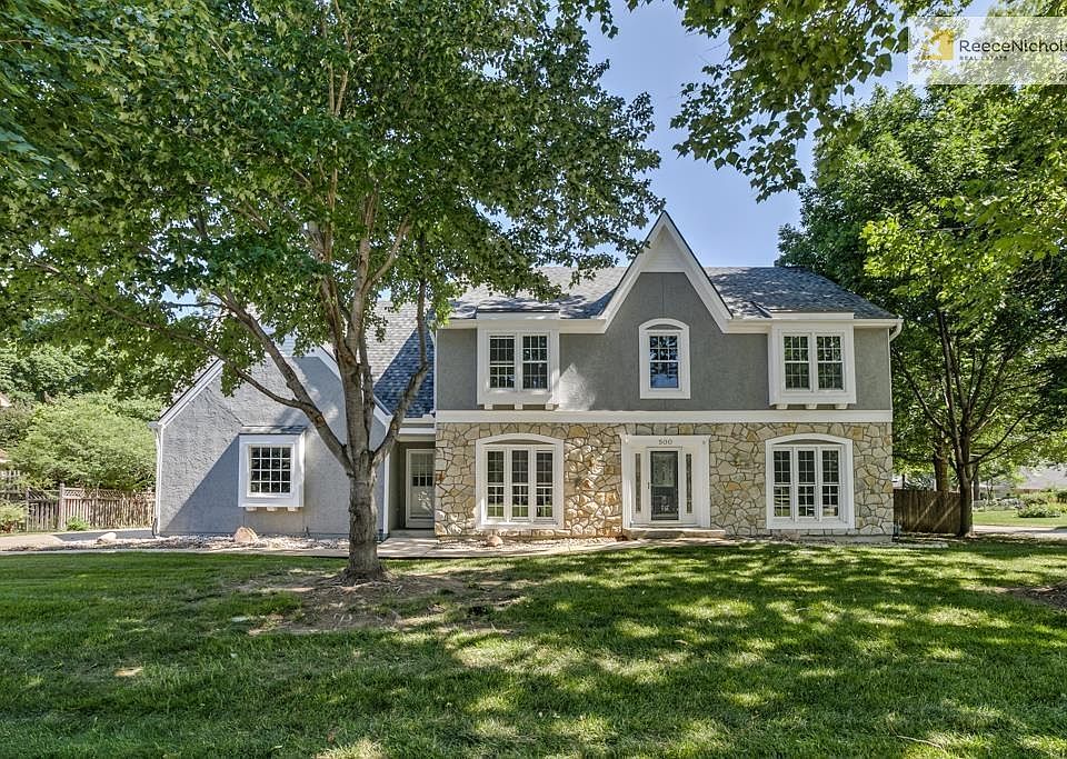This spacious 2 story home sits on a large corner lot with side car garage and tree fenced back yard.