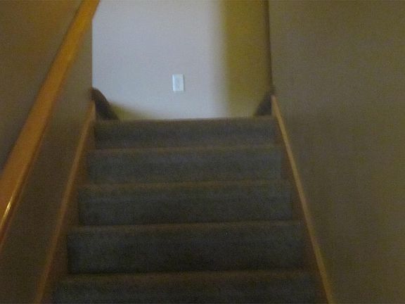Stairway to upstairs bedroom and bath