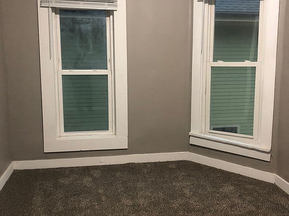 Unit 3 - Large bedroom with natural lighting.
