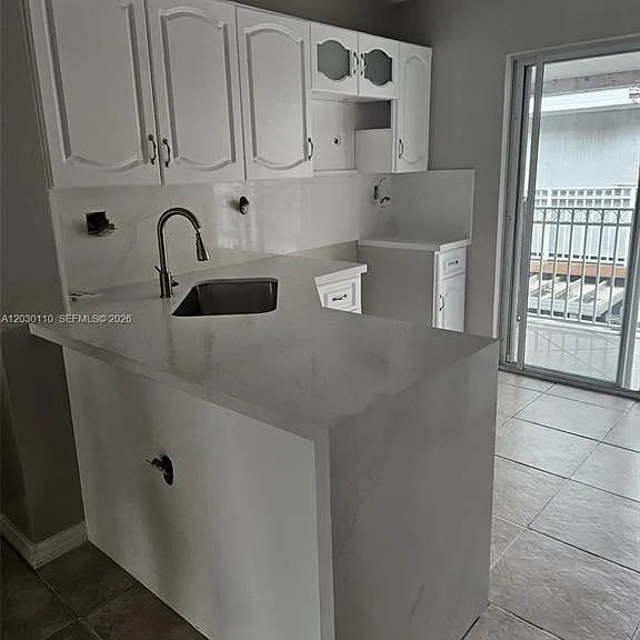 2527 W 76th St #208 — Photo 13