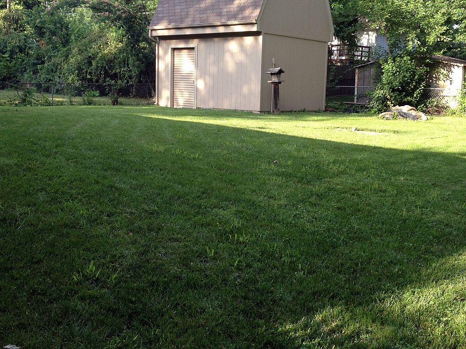 Large shed in fenced lot