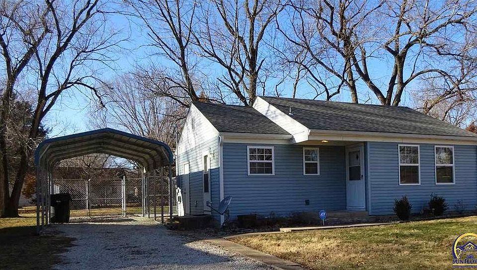 Front w/ carport