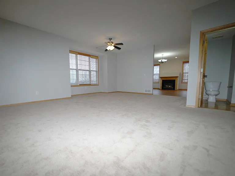 Oversized family room with a lot of natural light in this end unit townhouse