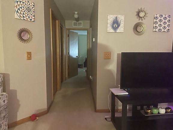 Hallway to second bedroom and utilities