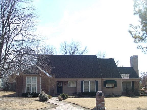 Professional landscaping, sprinkler system, new quality comp roof.