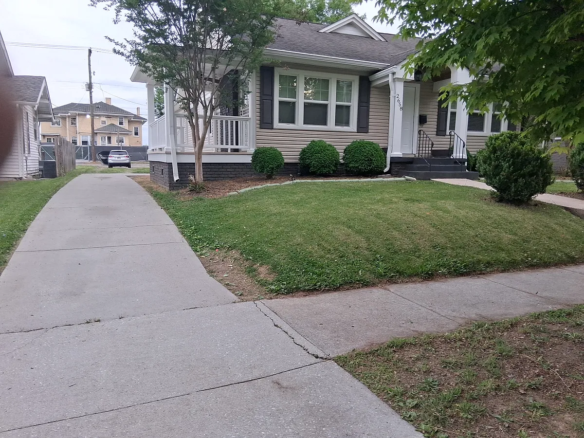 Drive-thru lot, street to alley. House is 1 away from the corner - 2658 E 5th Ave