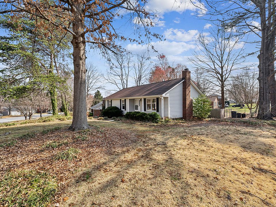 Charming, clean home on large corner lot with lots of space, greenery and yard care included!