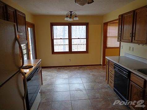 Lovely kitchen with newer large tile and breakfast area!