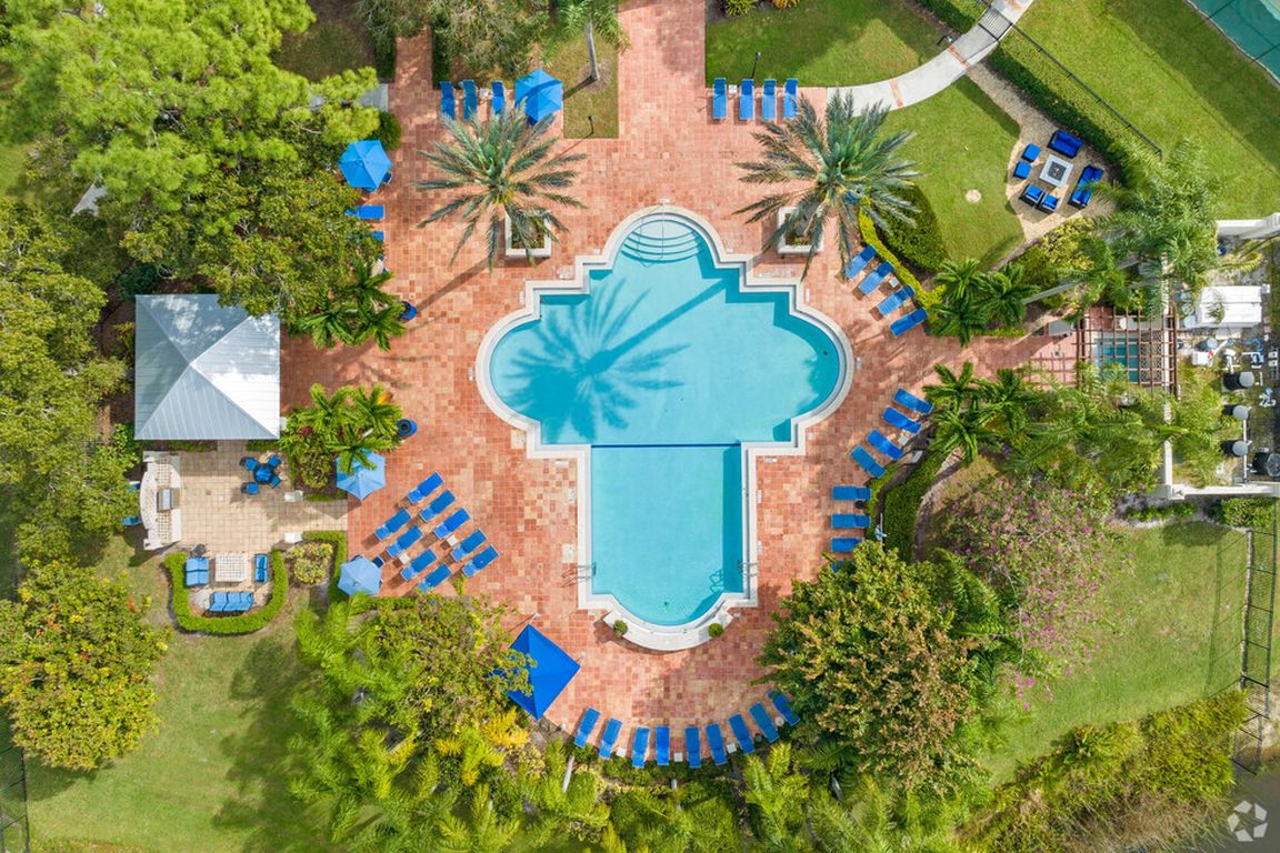 What a view! There's plenty of space for all your friends _ lounge by the pool, soak up the sun, and enjoy every moment.