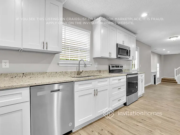 5614 Carriage Walk Way — Photo 9