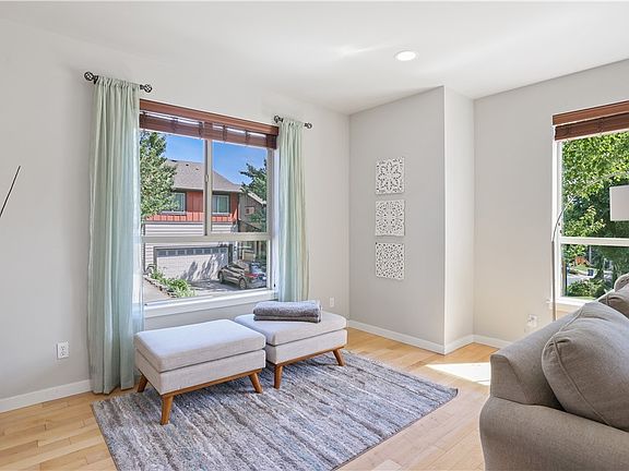 The living room features extra room here for either additional guest seating or a table. Great flexible floor plan provides you with terrific options so YOU can furnish the space for your specific desires.