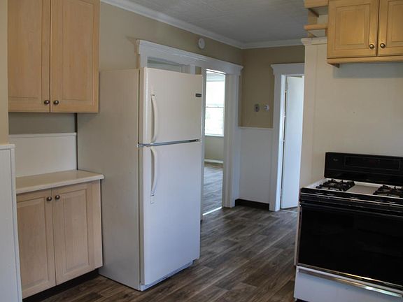 Kitchen showing fridge