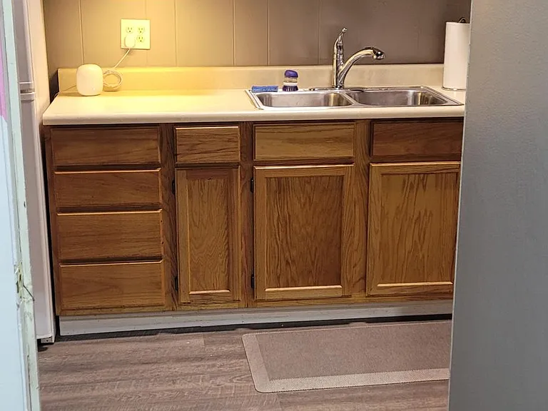 Kitchen from laundry room, locked form unit side when not using.
