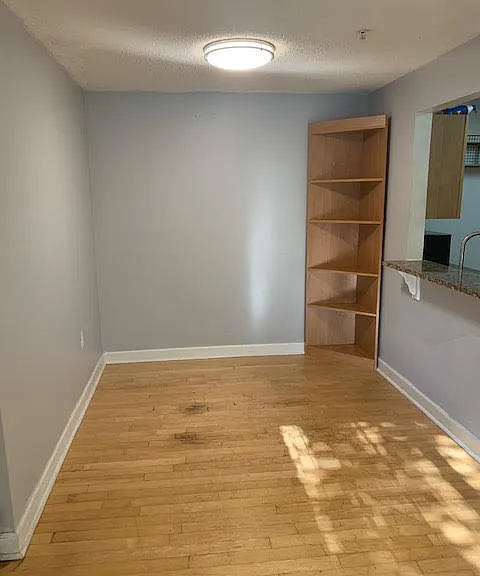 Dining area with breakfast counter into kitchen