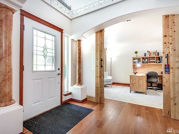 Slider doors close off the office/den for privacy.