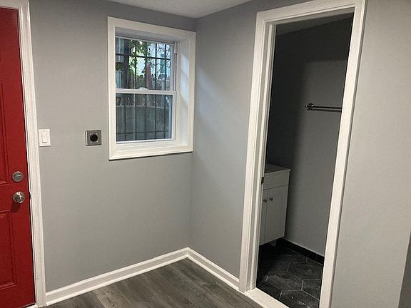 Laundry room & half bathroom- first floor