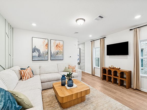 Family Room. Sample image for illustration upgrades, options, and colors may vary.