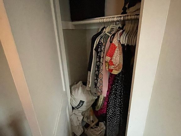 Closet inside bedroom.