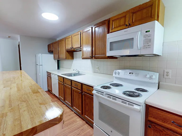 designer breakfast bar with newer fully applianced!